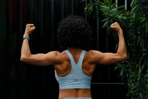 Lady showing back muscles